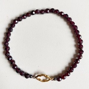 Satya stretch bracelet, like new. Garnet